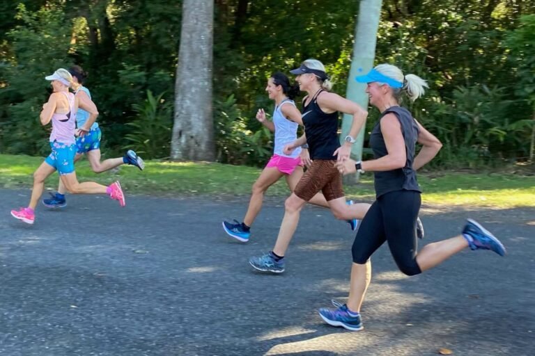 image of women running on a road