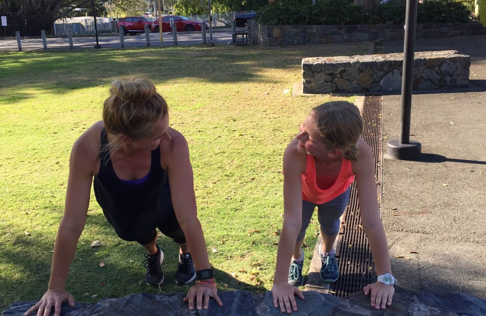 Anna mother-daughter pushups on rock wall