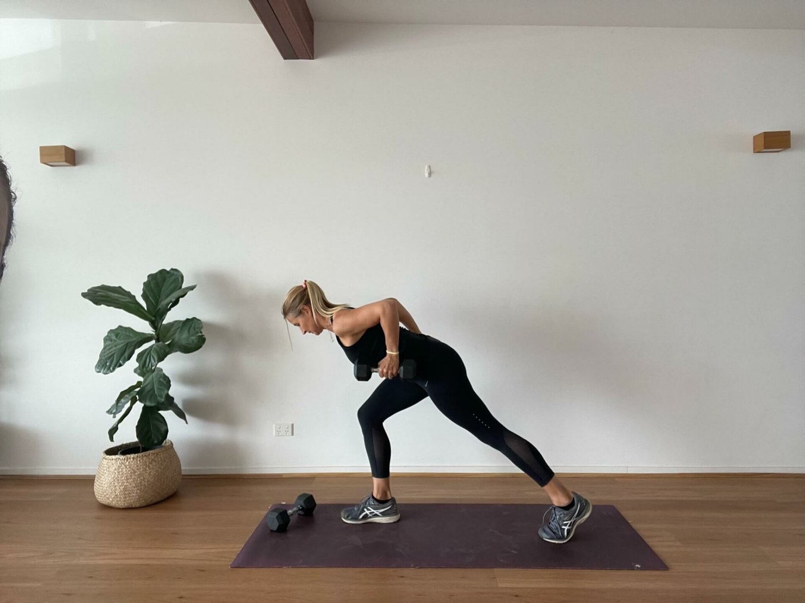 Anna in studio in bent over row