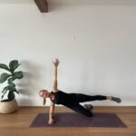 Anna in studio doing side plank