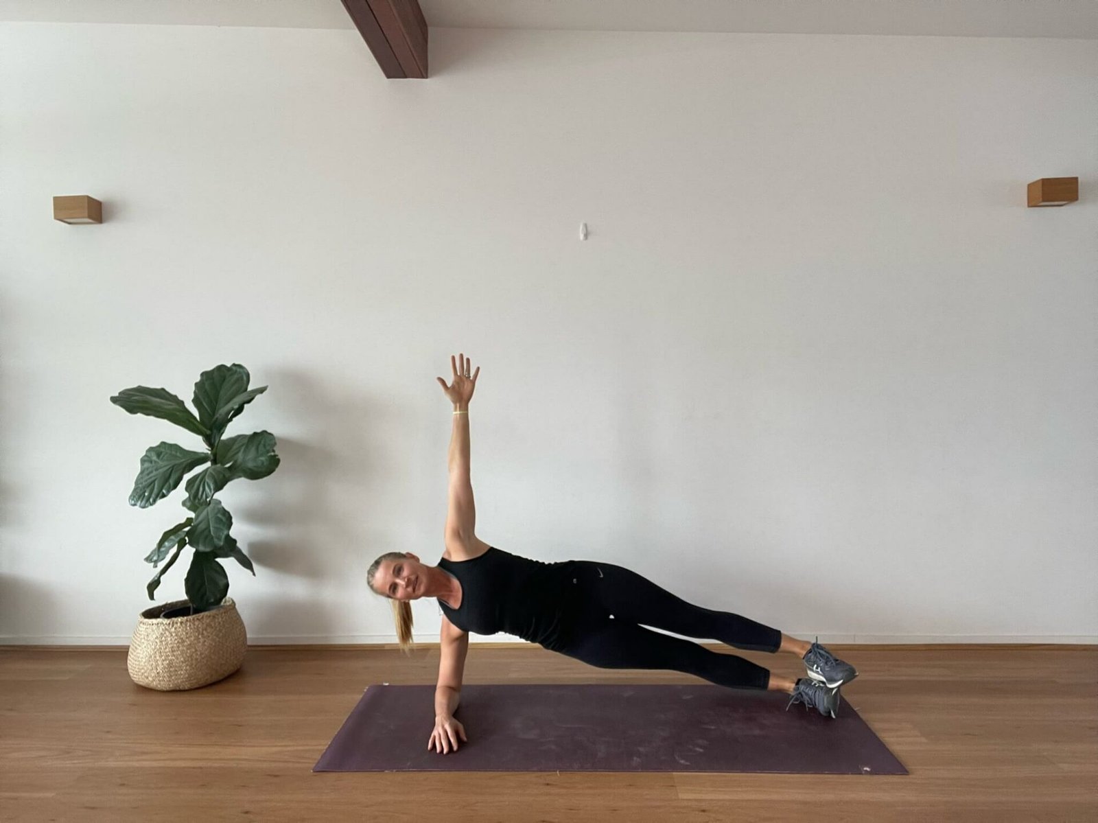 Anna in studio in side plank