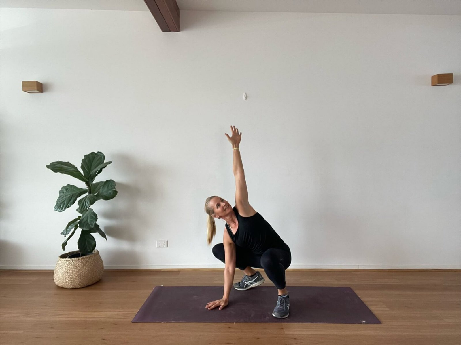 Anna in studio in twisted buddah pose